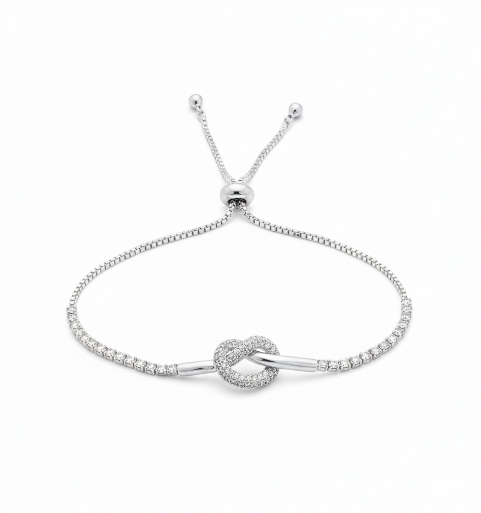 Silver Love Knot Bracelet – Adjustable CZ Tennis Chain by AurviJewelry