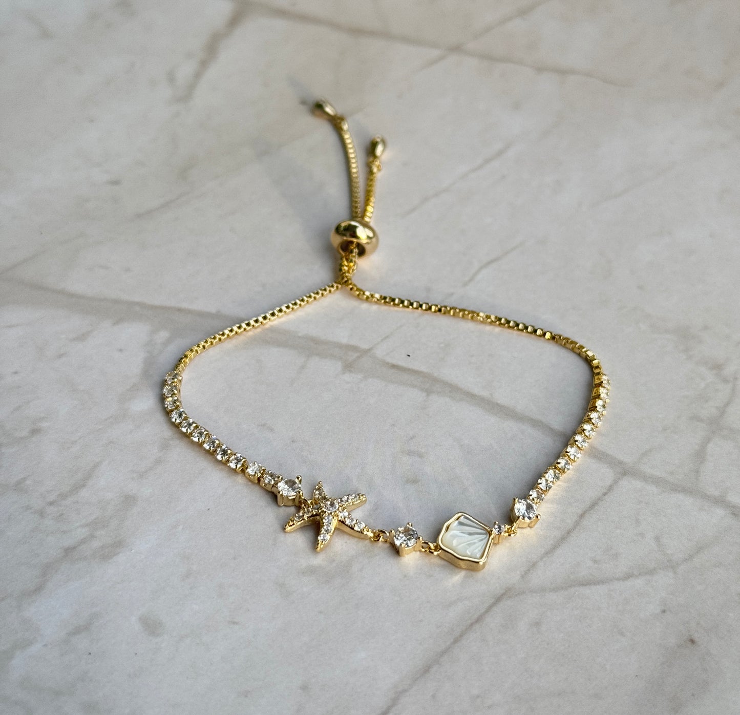 Gold Starfish Tennis Bracelet – Adjustable CZ Chain with Shell Charm
