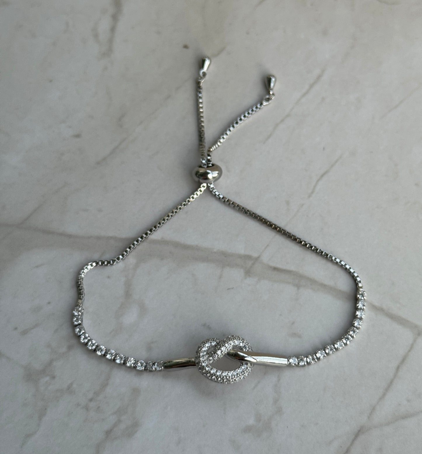 Silver Love Knot Bracelet – Adjustable CZ Tennis Chain