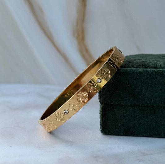 Gold Clover Engraved Bangle – CZ Accent Bracelet for Women